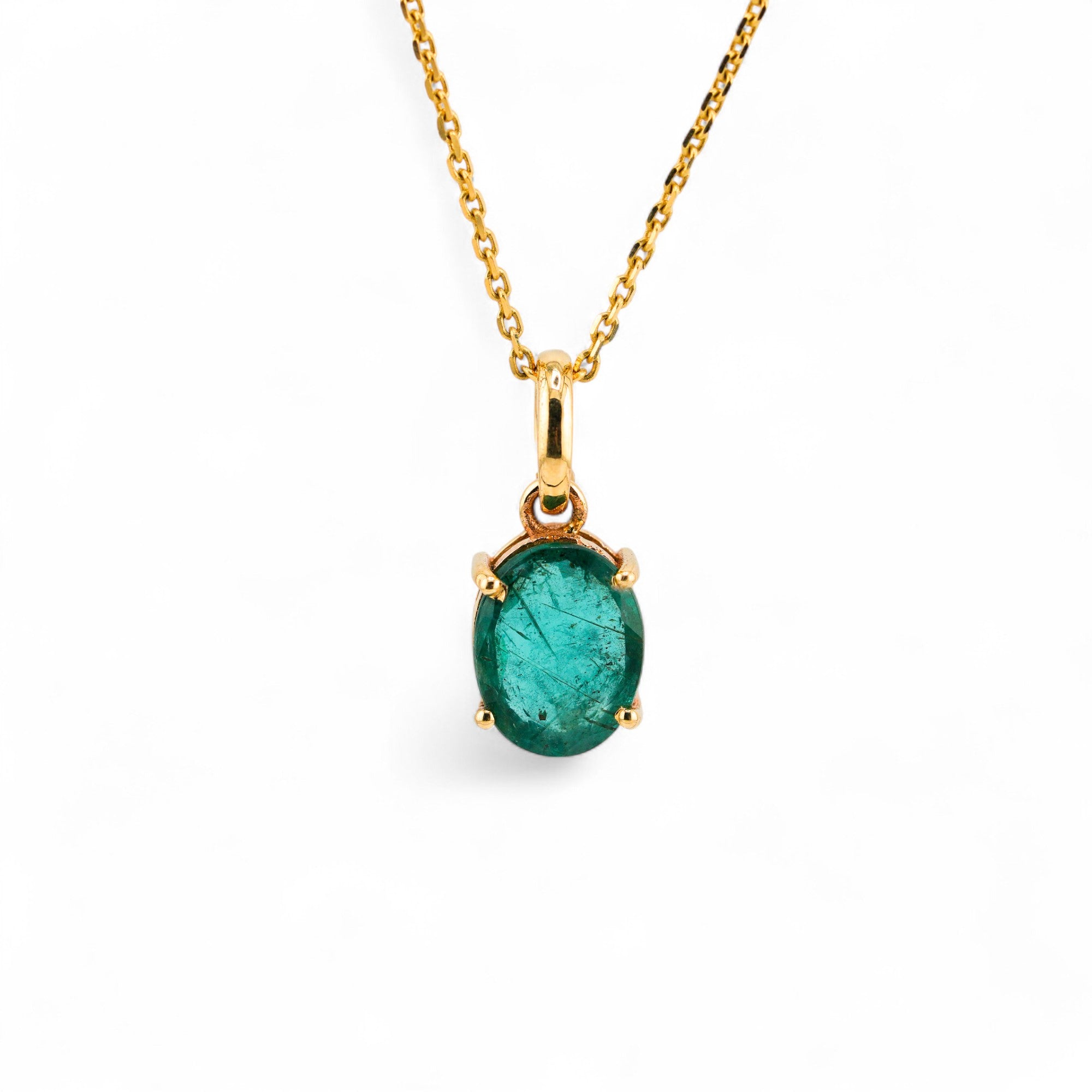 Emerald gold pendant