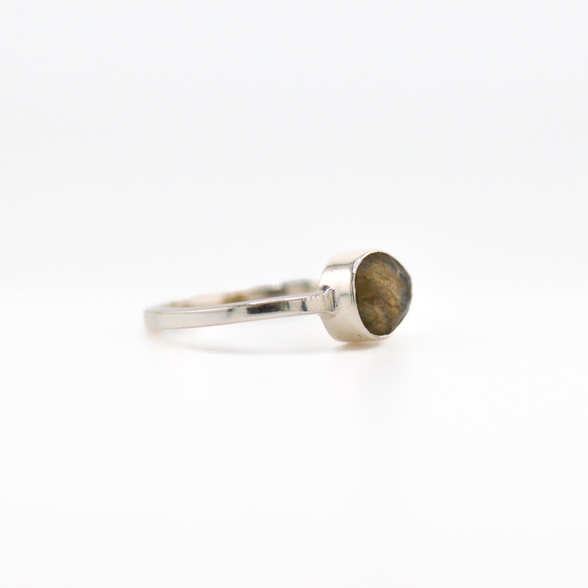 Tilted oval labradorite ring