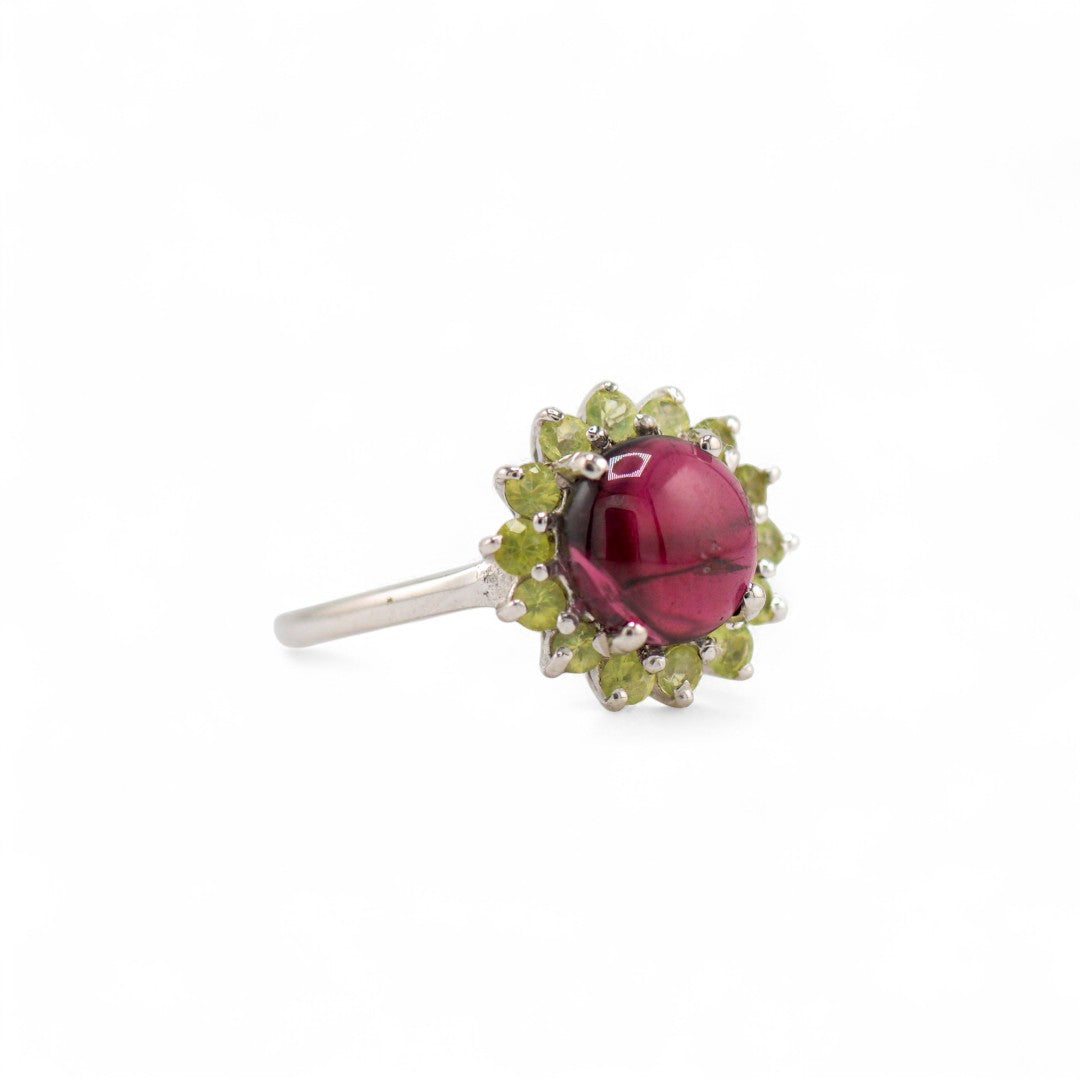Laxmi garnet and peridot ring