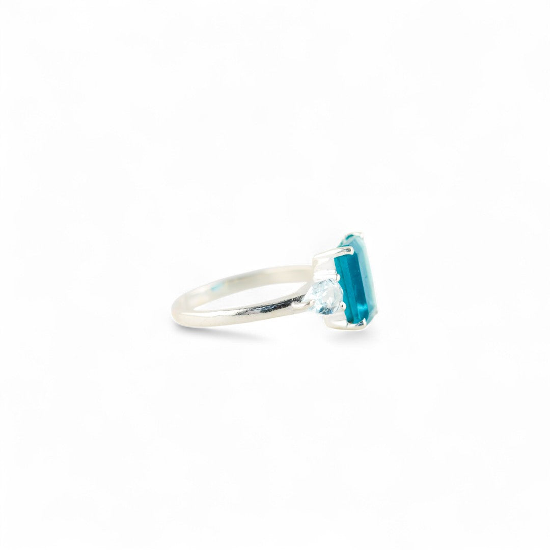 Gaia fluorite with blue topaz ring