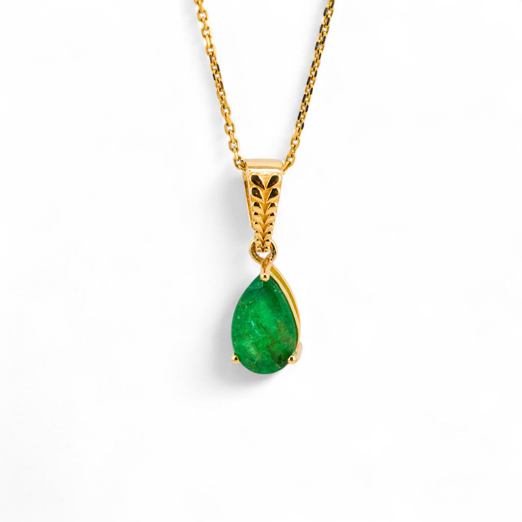 Emerald gold pendant