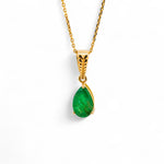 Emerald gold pendant
