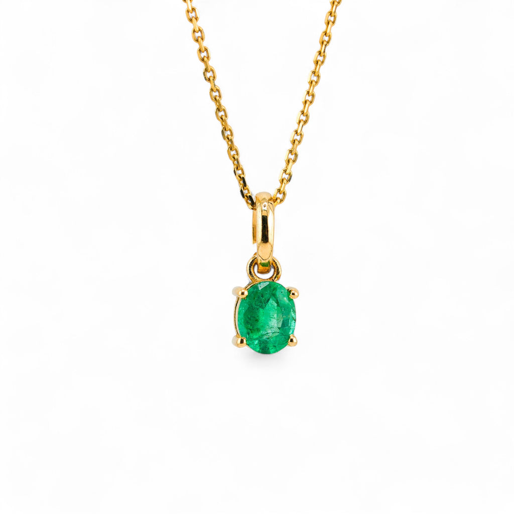 Emerald gold pendant