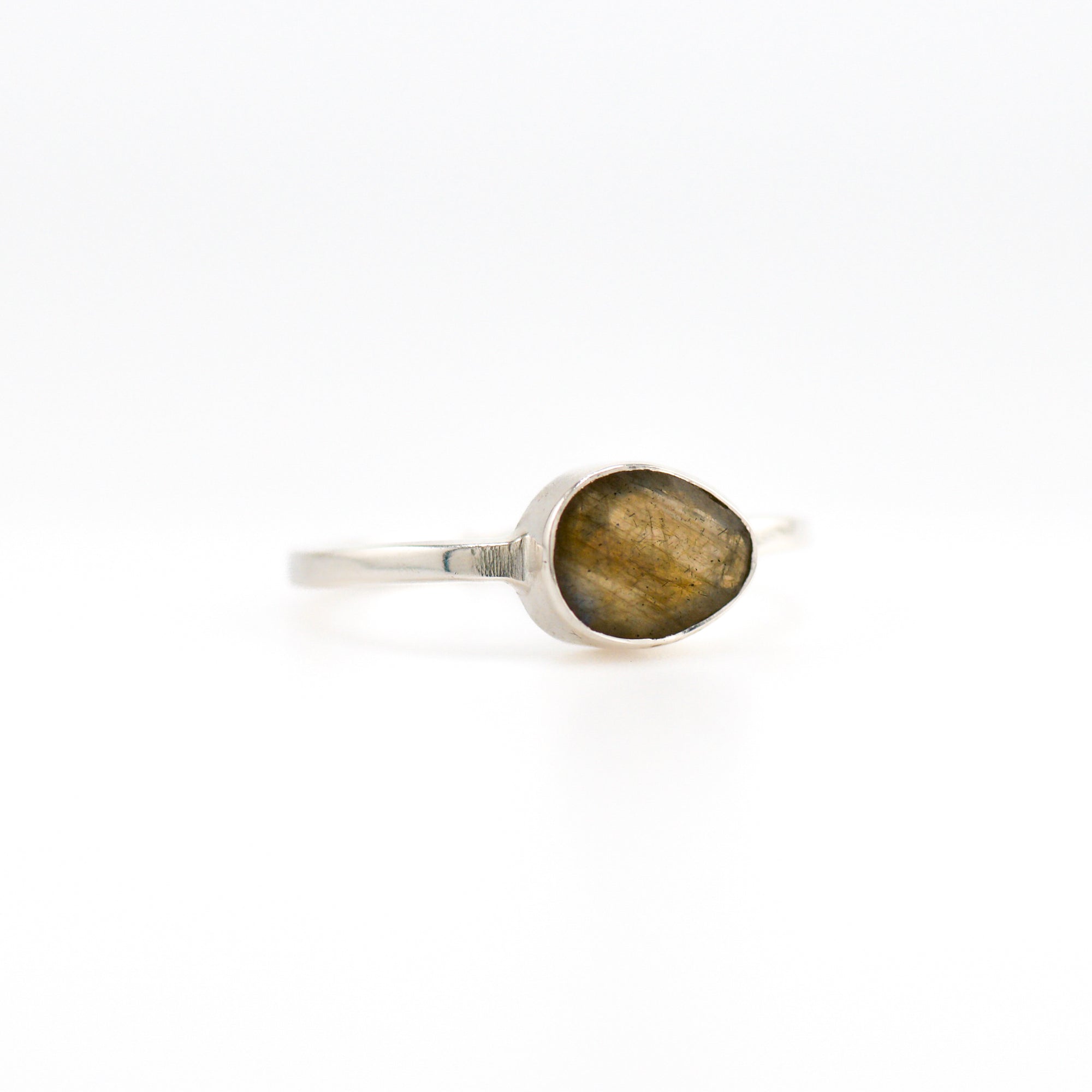 Tilted oval labradorite ring