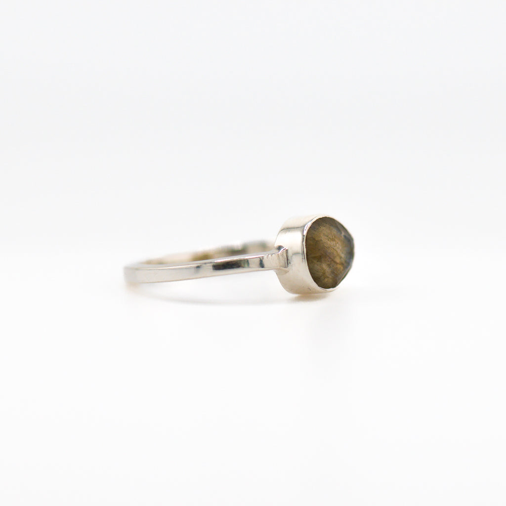 Tilted oval labradorite ring